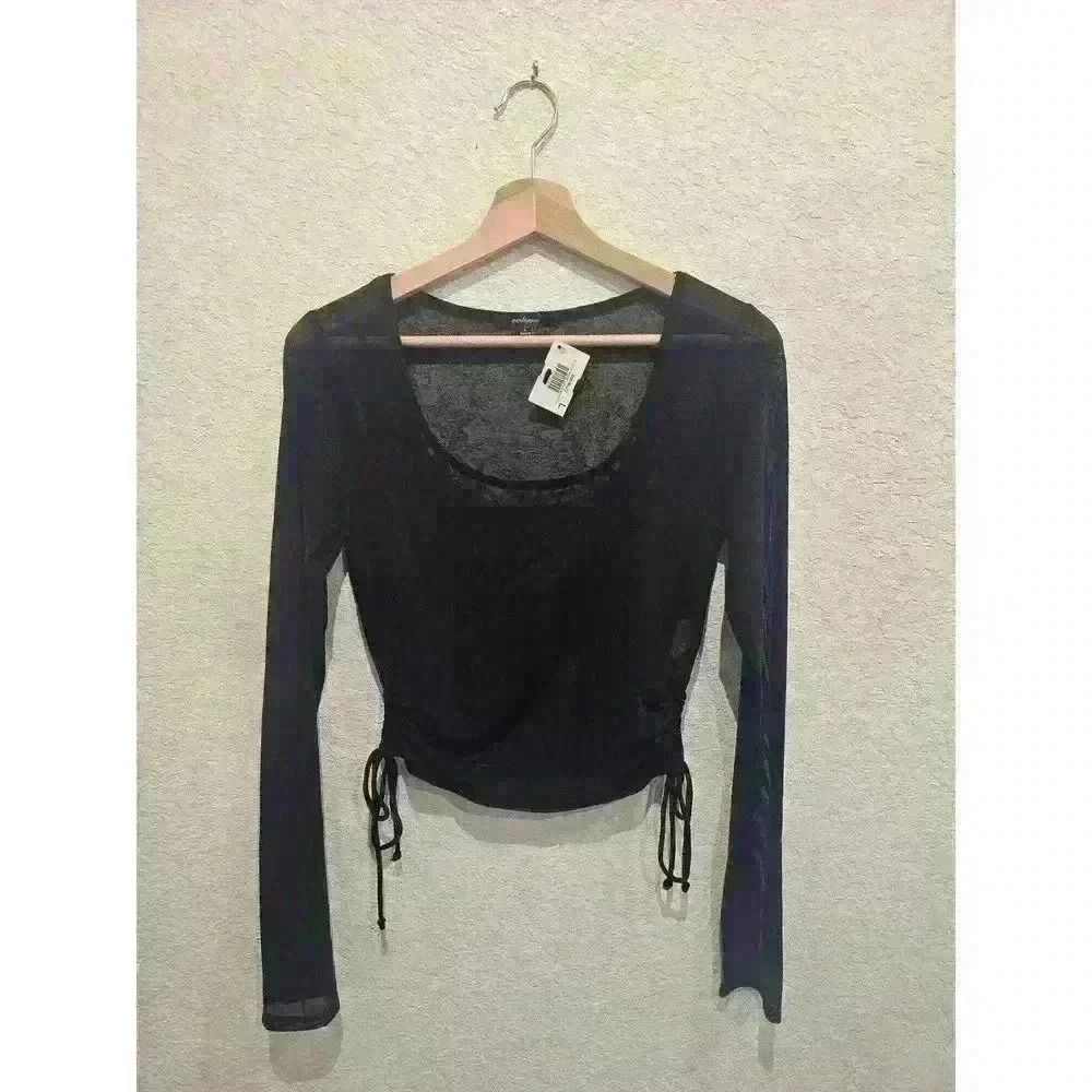 Cinched black mesh top. .